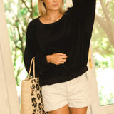 Sac à main en raphia naturel motif léopard porté coudes- LÉONA