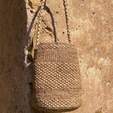 Détail du raphia naturel du sac seau SINY thé