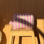 trousse de toilette en coton matelassé imprimé motifs floral lilas 